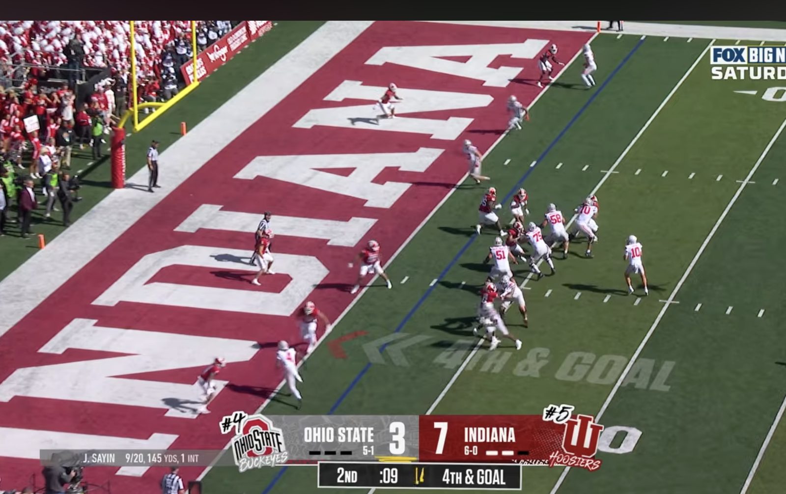 Fourth and goal, Ohio State empty, the far-side grass empty while the numbers sit on Smith’s side